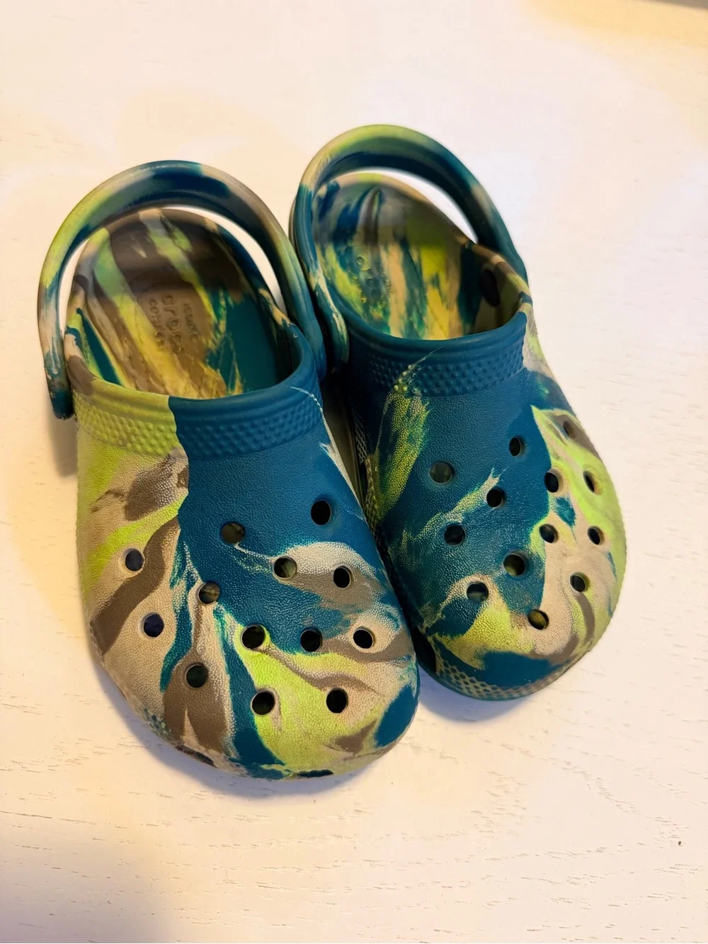 Kids Crocs Slip-On Clogs in Blue & Green swirl pattern